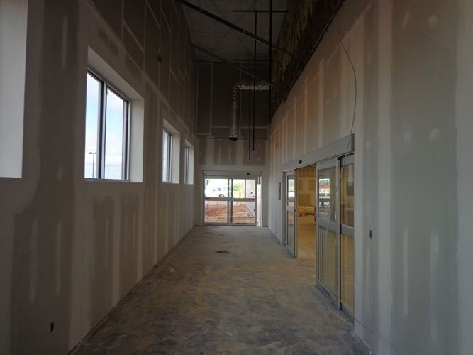 Commercial drywall hanging and finishing in progress